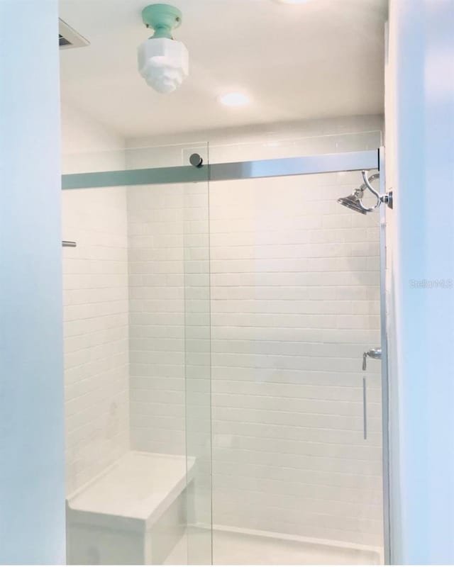 bathroom with walk in shower