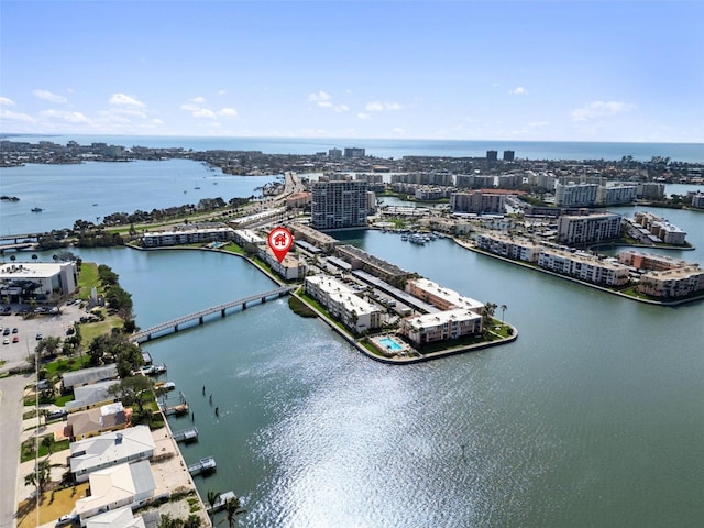 aerial view featuring a view of city and a water view