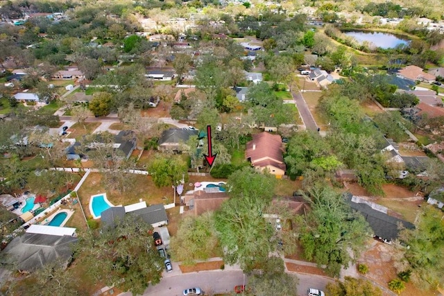 aerial view with a residential view and a water view