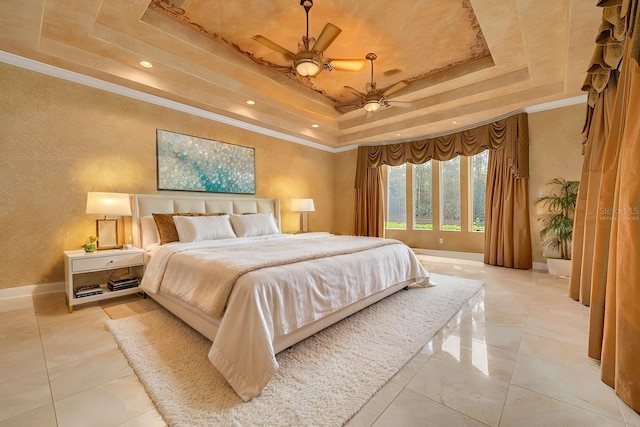 bedroom featuring crown molding, ceiling fan, and a tray ceiling