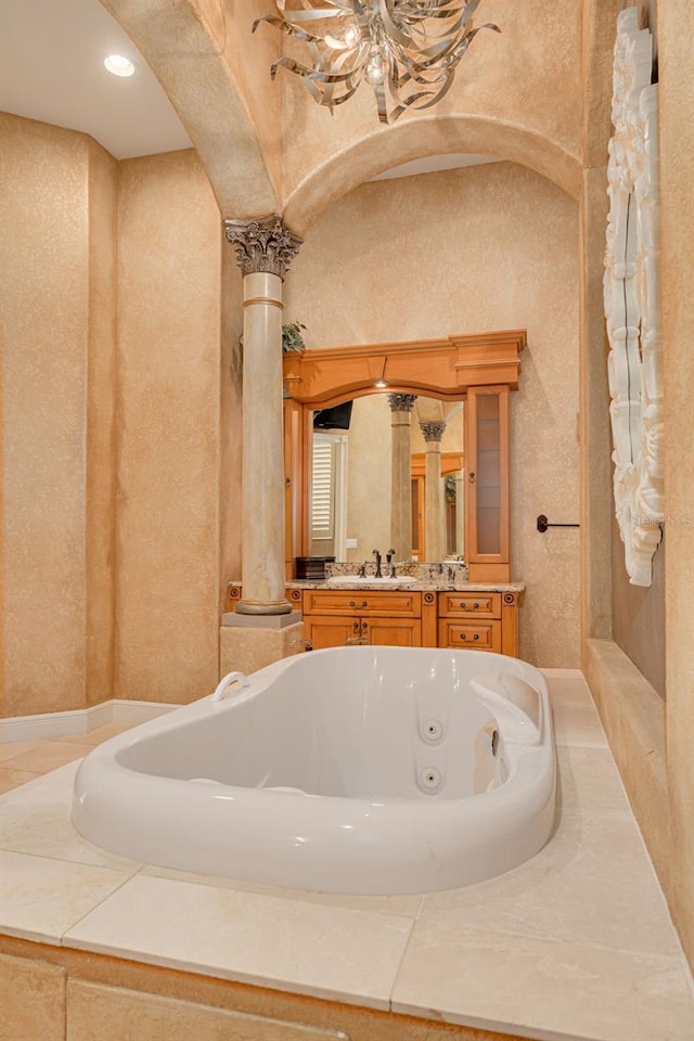 bathroom with sink and ornate columns