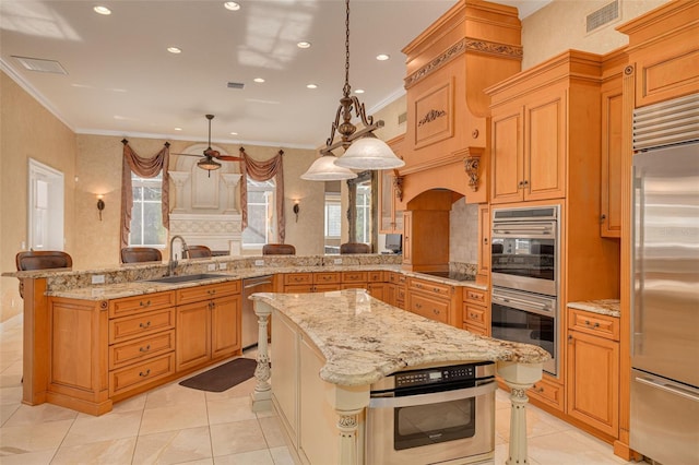 kitchen with a breakfast bar, stainless steel appliances, kitchen peninsula, and hanging light fixtures