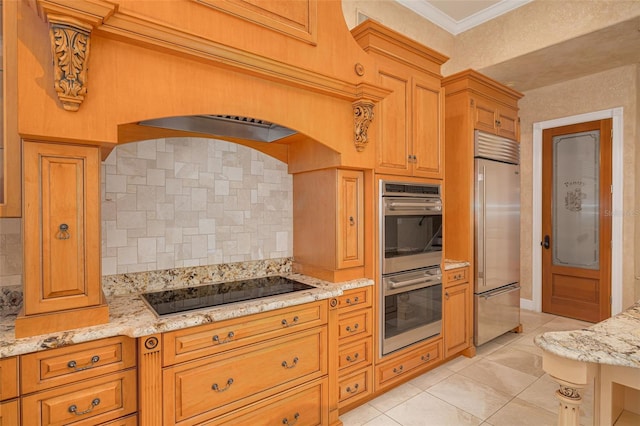 kitchen featuring crown molding, appliances with stainless steel finishes, light stone counters, and decorative backsplash