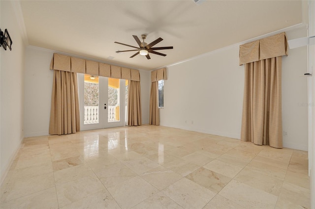 empty room with crown molding, french doors, and ceiling fan