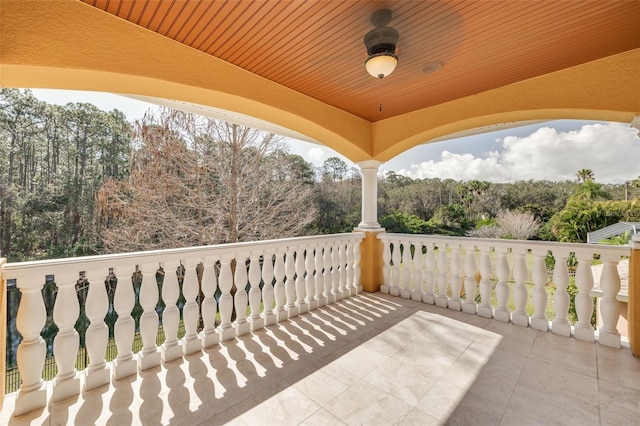 view of patio featuring a balcony