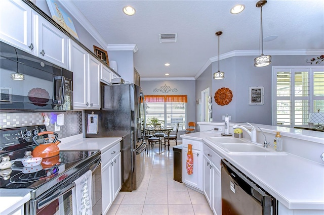 kitchen featuring pendant lighting, white cabinetry, sink, light tile patterned floors, and black appliances