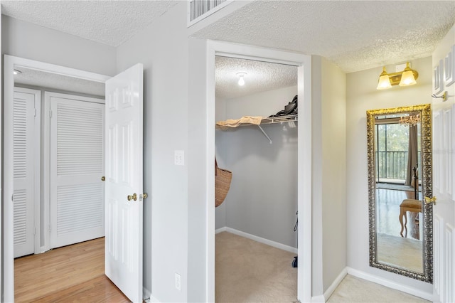 closet featuring visible vents