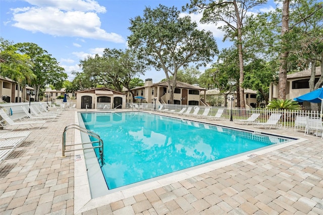 view of pool featuring a patio