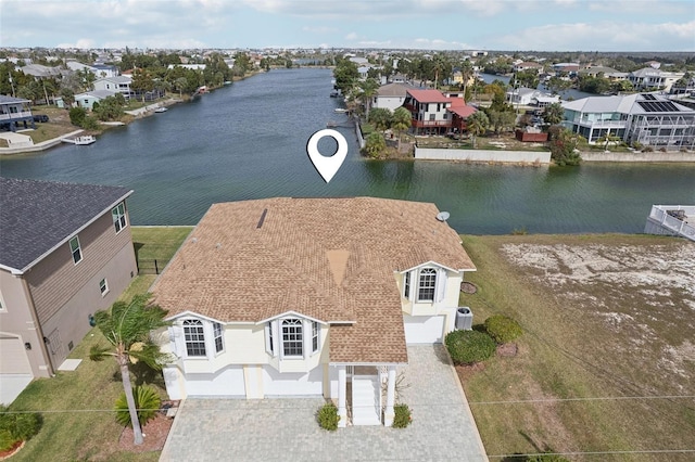 aerial view featuring a water view and a residential view