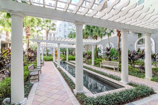 view of patio featuring a pergola