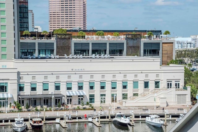 exterior space with a view of city and a water view