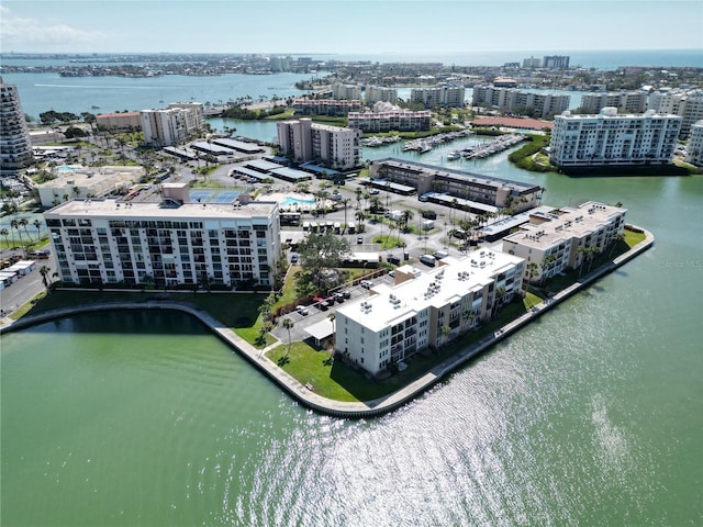 bird's eye view featuring a water view and a city view