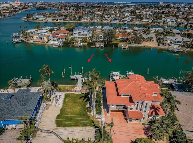 aerial view featuring a water view and a residential view