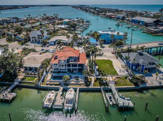 birds eye view of property featuring a residential view and a water view