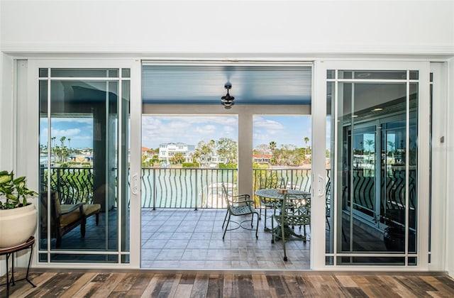 doorway to outside with wood finished floors