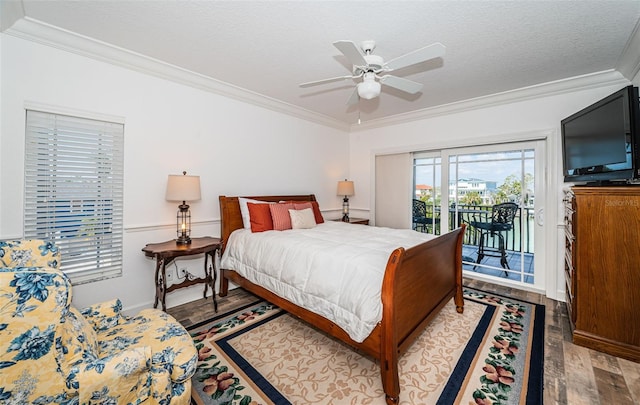 bedroom with ceiling fan, ornamental molding, wood finished floors, access to outside, and a textured ceiling