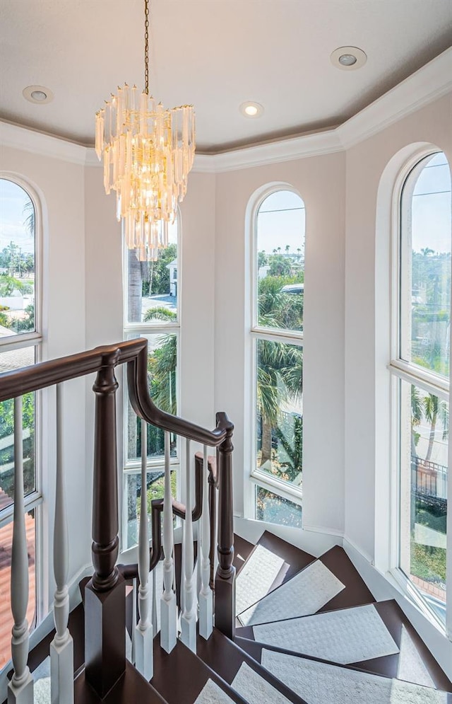 interior space featuring recessed lighting, crown molding, and wood finished floors