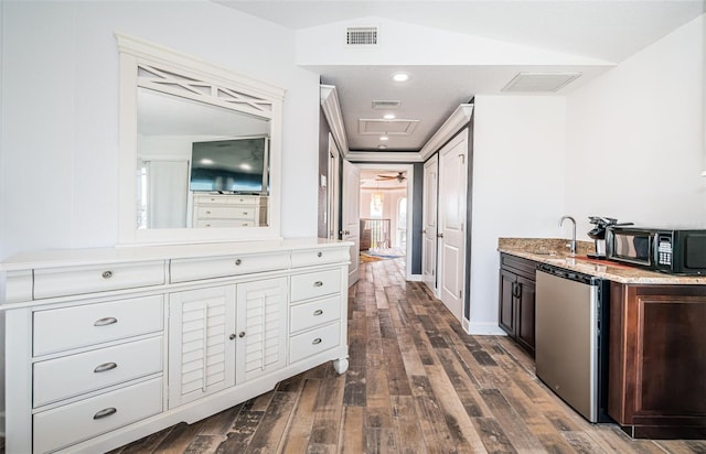 interior space with light countertops, white cabinetry, dark brown cabinets, black microwave, and dishwashing machine