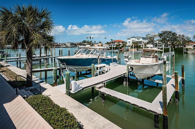 view of dock with a water view and boat lift