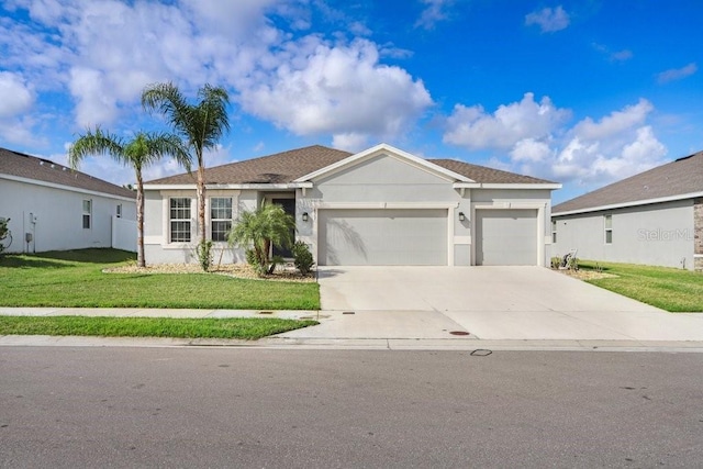 single story home featuring a garage and a front yard