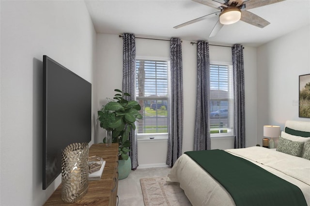 6307 113th Ter E, Parrish, FL 34219 - bedroom featuring light colored carpet, baseboards, and a ceiling fan