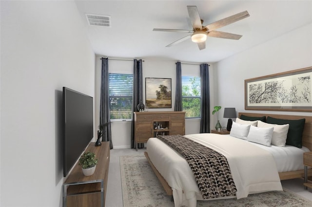 6307 113th Ter E, Parrish, FL 34219 - bedroom featuring multiple windows and ceiling fan