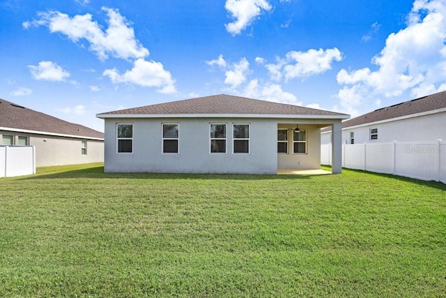6307 113th Ter E, Parrish, FL 34219 - rear view of property with ceiling fan, stucco siding, a patio, and roof with shingles