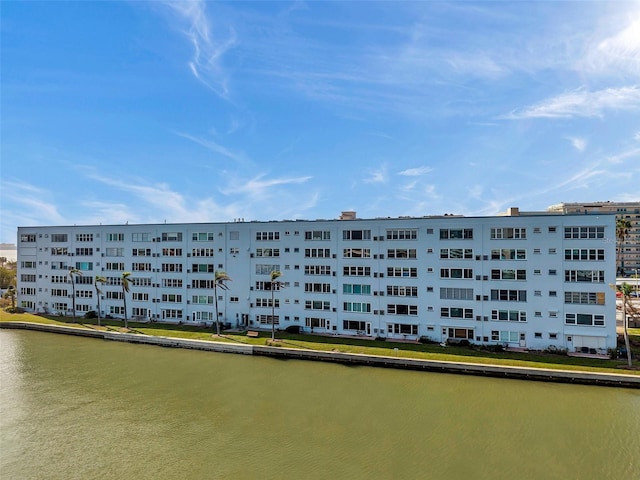 view of building exterior featuring a water view