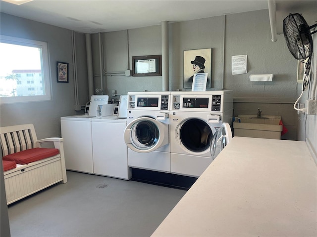 washroom featuring washer and clothes dryer