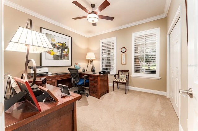 office featuring ceiling fan, crown molding, and light colored carpet