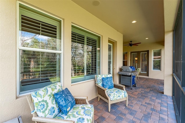 view of patio / terrace with ceiling fan and grilling area