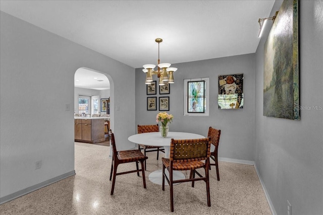 dining room featuring a chandelier