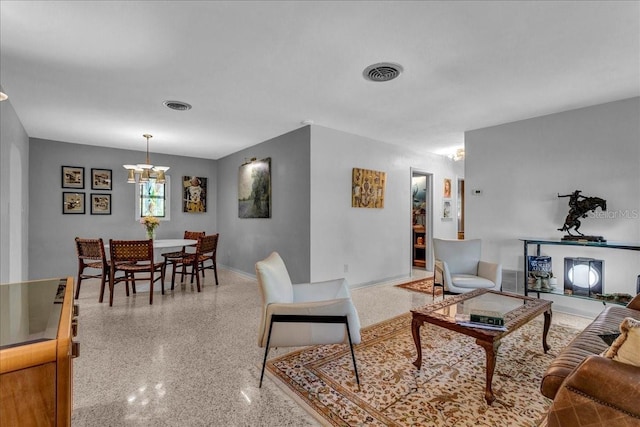 living room featuring a chandelier