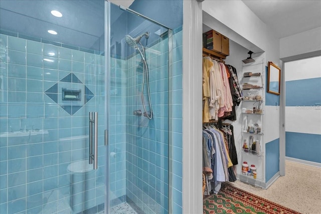 bathroom featuring an enclosed shower