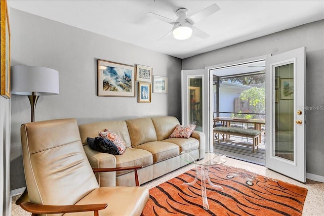 living room featuring ceiling fan