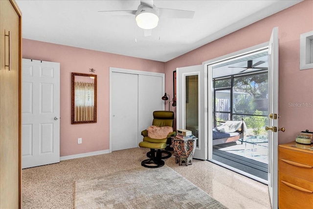 interior space with ceiling fan