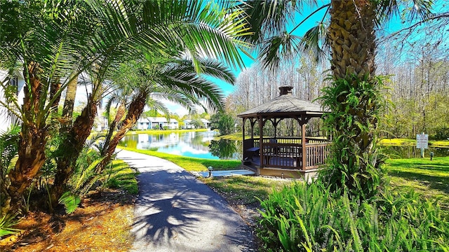 view of community with a water view and a gazebo