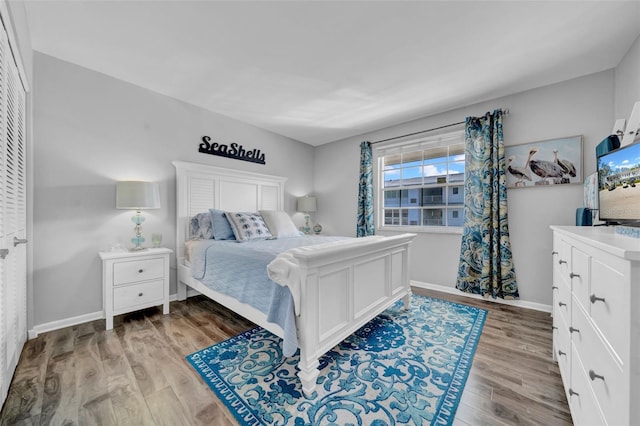 bedroom featuring light wood-type flooring