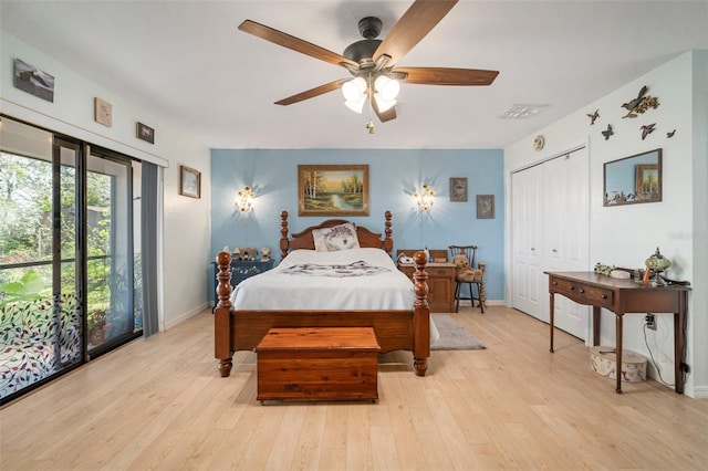 bedroom with a closet, access to outside, ceiling fan, and light hardwood / wood-style flooring