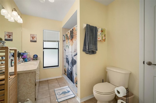 bathroom featuring vanity, walk in shower, tile patterned floors, and toilet