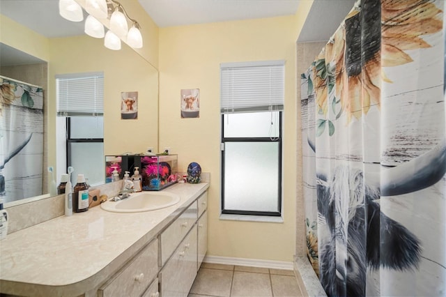 bathroom with tile patterned flooring, vanity, and a shower with shower curtain