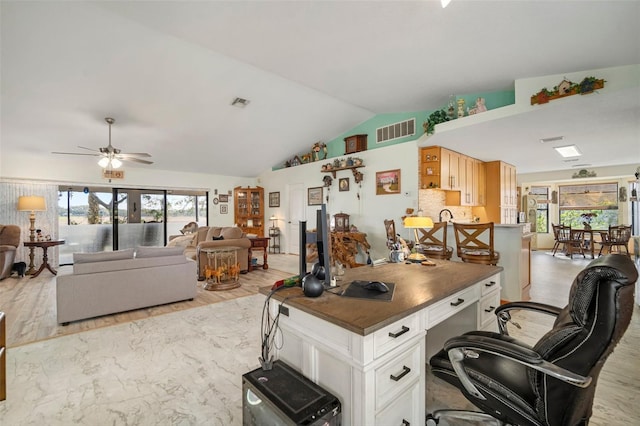 1472 Ivydale Rd, Spring Hill, FL 34606 - office with lofted ceiling, plenty of natural light, ceiling fan, and light wood-style floors