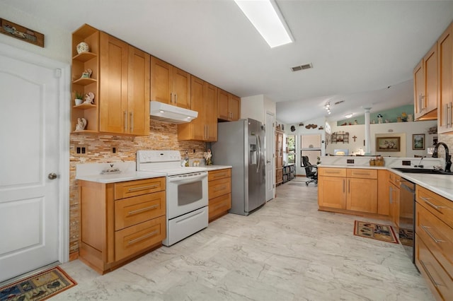 1472 Ivydale Rd, Spring Hill, FL 34606 - kitchen with electric range, stainless steel refrigerator with ice dispenser, under cabinet range hood, a peninsula, and backsplash