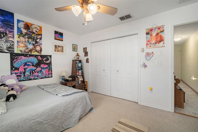 1472 Ivydale Rd, Spring Hill, FL 34606 - carpeted bedroom featuring a closet, a ceiling fan, and baseboards