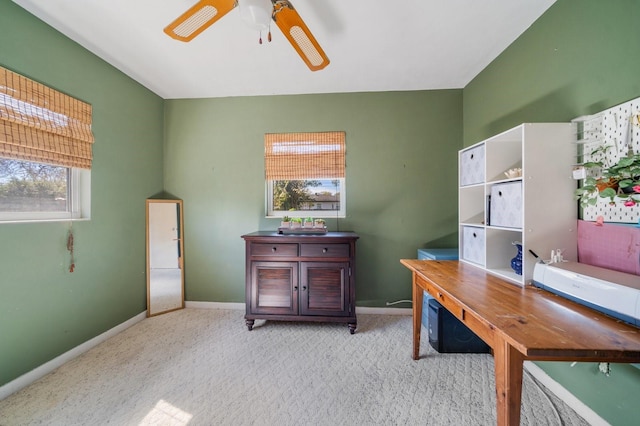 office featuring light carpet and ceiling fan