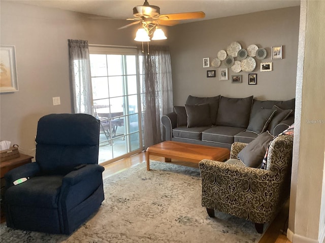 living room featuring ceiling fan