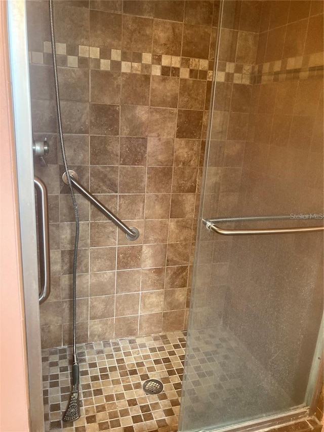 bathroom featuring walk in shower