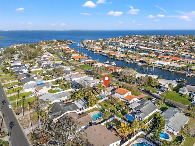 bird's eye view with a water view