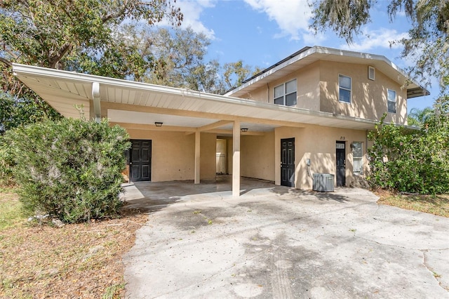 view of front of house with a carport