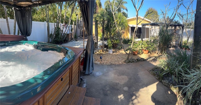 view of patio featuring a hot tub